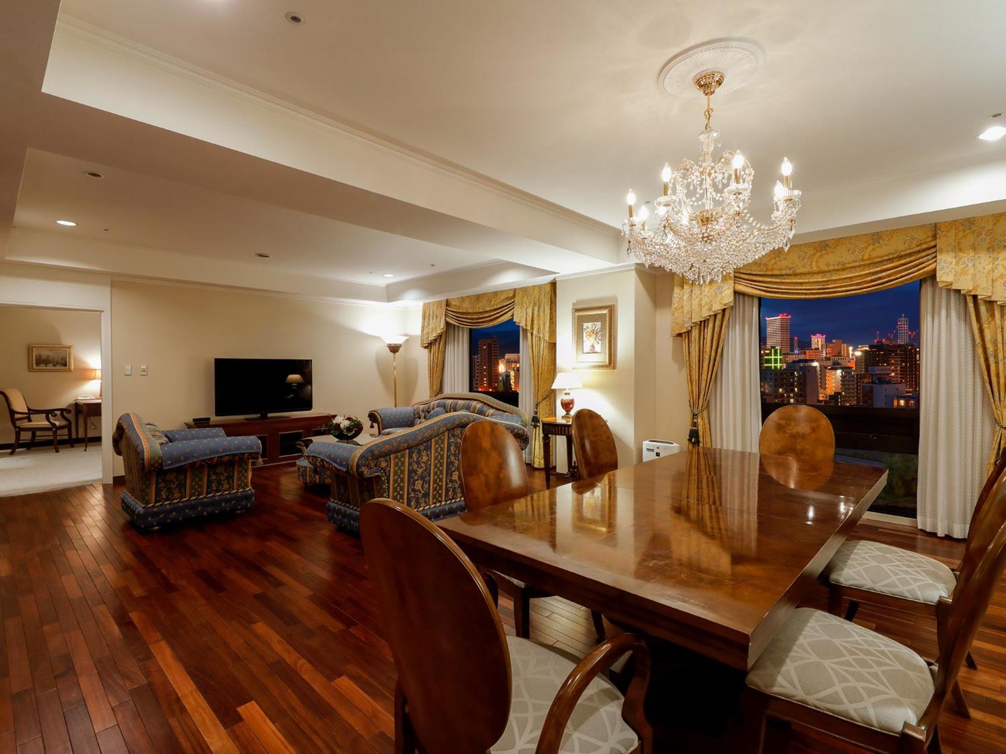 فندق بريمير -تسيوباكي- سابورو المظهر الخارجي الصورة A living room in a condominium